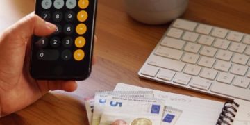 closeup-shot-entrepreneur-working-from-home-his-personal-finances-savings