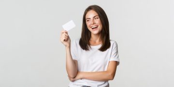 A happy girl with the neo credit card.