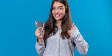 A girl using the Southwest Rapid Rewards Plus Credit Card