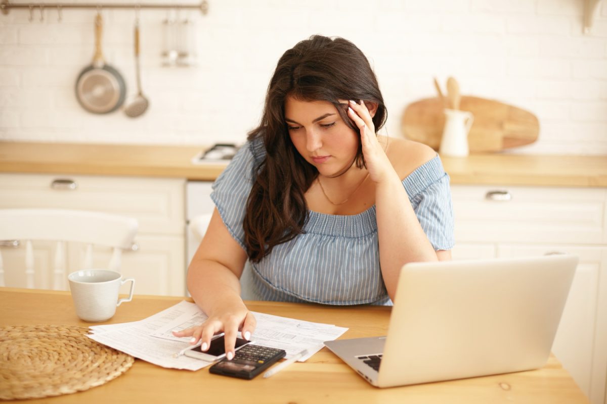 Woman learning what is a bad credit score in Canada.