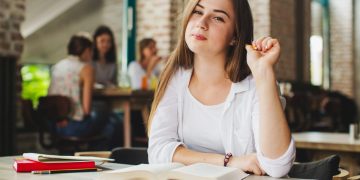 A girl learning How to Apply for a Student Loan in Canada.