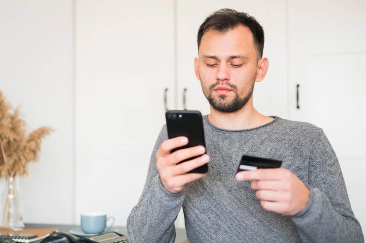 A man learning How to Cancel a Credit Card.