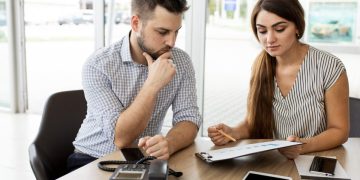 A man learning about an Unsecured Personal Loan.