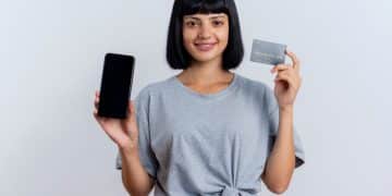 Woman holding her CareCredit Card.