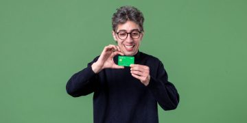 A man using his Chime Credit Builder Secured Visa.