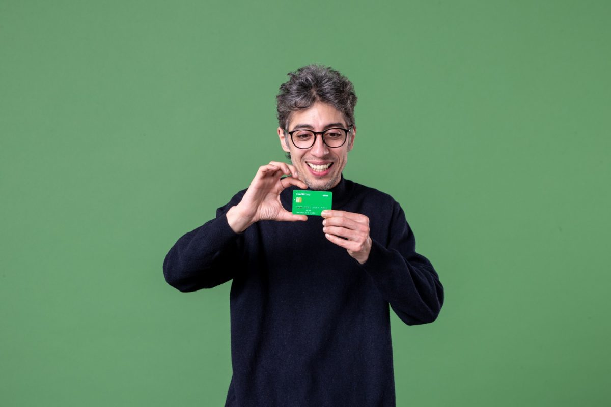 A man using his Chime Credit Builder Secured Visa.