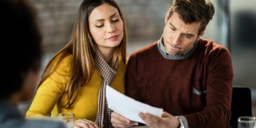 A couple looking for Types of Emergency Loans.