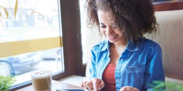 Woman learning about Overdraft Protection.