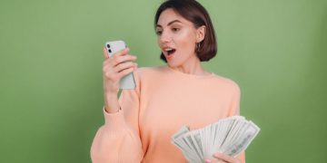Woman using Apple Cash