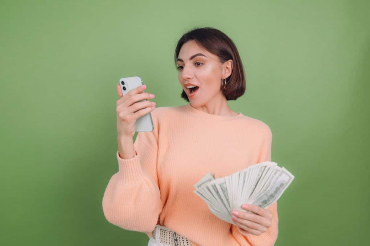 Woman using Apple Cash