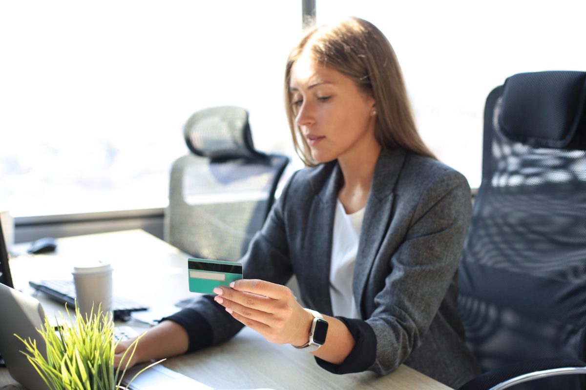 Woman learning about Co-signer on a credit card.