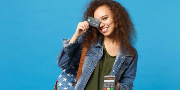 A girl enjoying Credit Card Tips for Students.