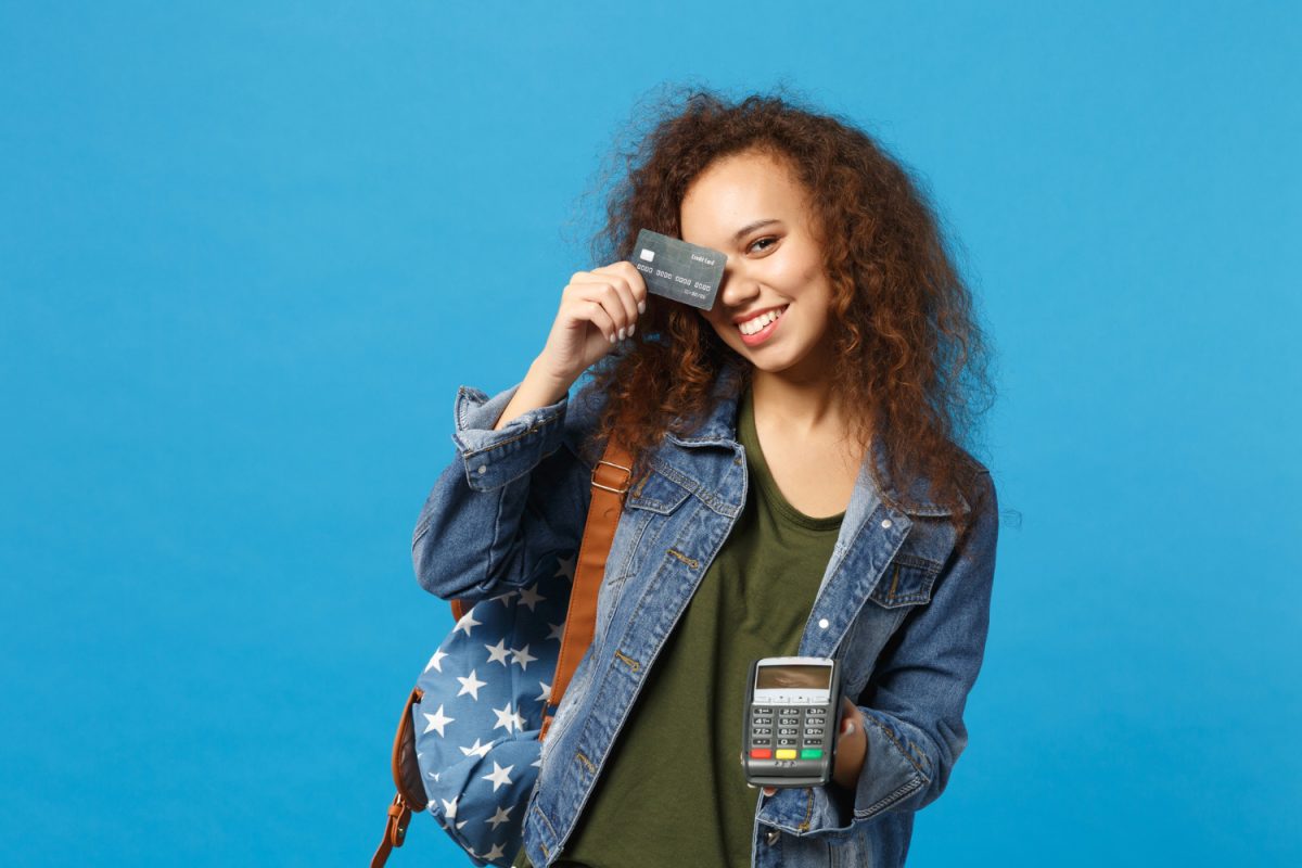 A girl enjoying Credit Card Tips for Students.