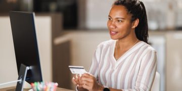 Woman learning How to switch banks in Canada.