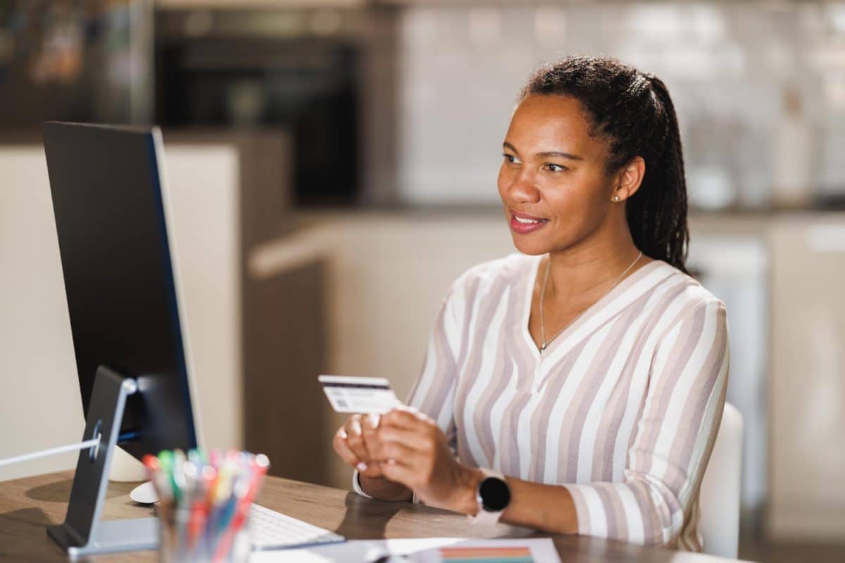 Woman learning How to switch banks in Canada.