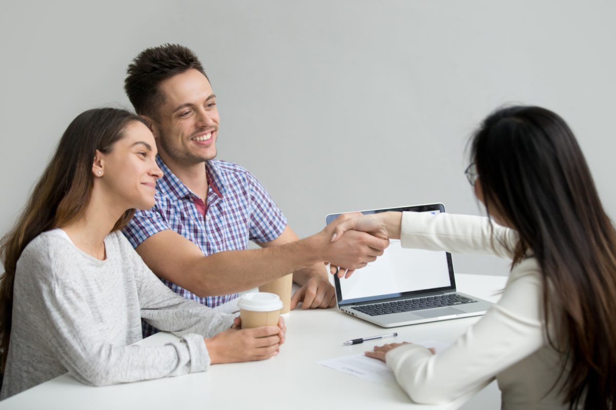 Couple making a Personal loan repayment
