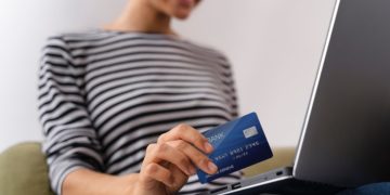 woman making a pre-authorized debit