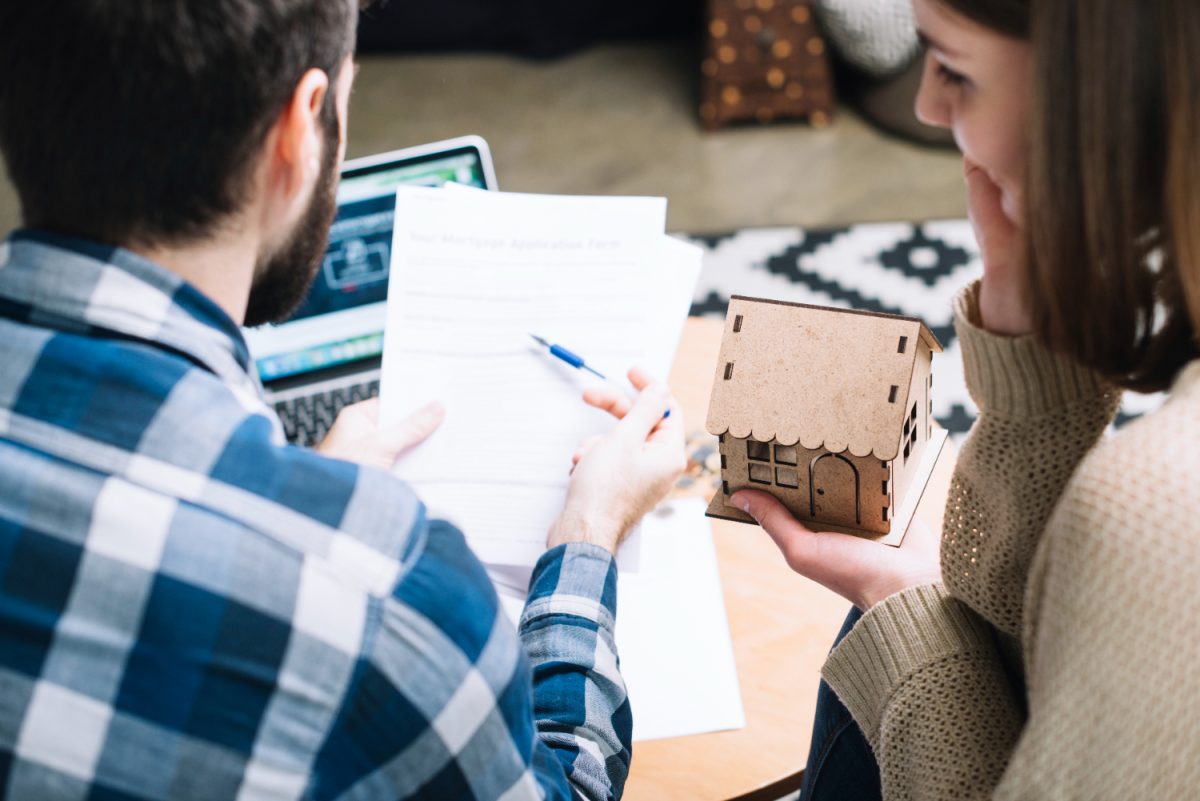 a couple checking the mortgage rates.