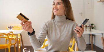 Woman using the Credit card to build credit