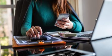 Woman after discover Types of bank accounts