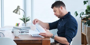 A man learning about RSP vs. RRSP.