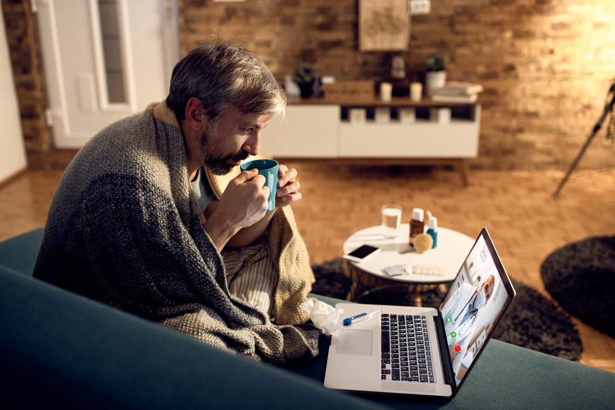 Canadian consumer using digital technology at home, representing changing purchasing and service habits.